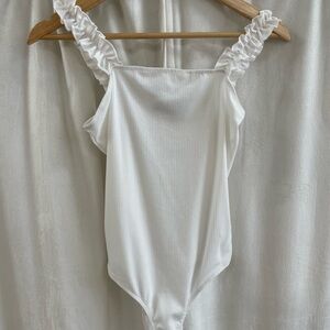 White Ribbed Ruffle Strap One-Piece Bodysuit